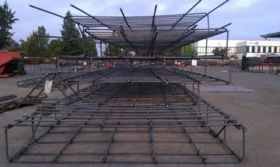 Preassembled footing rebar beams